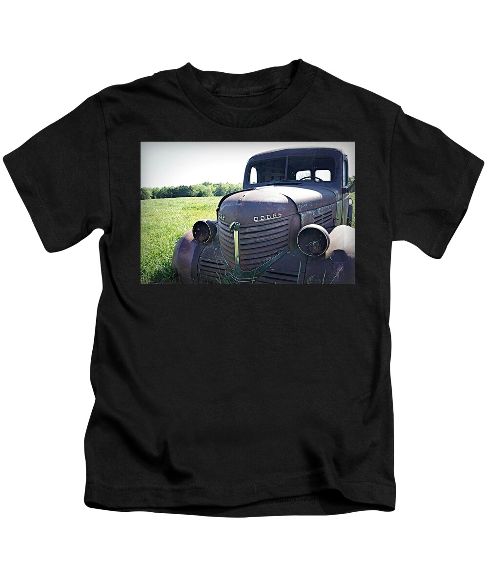 Dodge Kids T-Shirt featuring the photograph Out to Pasture by Cricket Hackmann