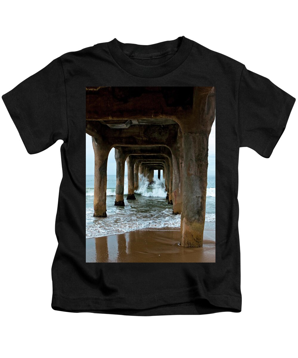 Crashing Waves Kids T-Shirt featuring the photograph Pounded Pier by Lorraine Devon Wilke