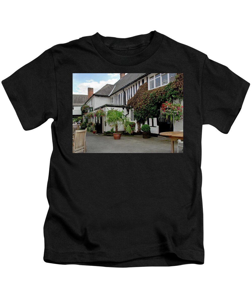 White House Kids T-Shirt featuring the photograph Quiet street with flowers on walls. by Elena Perelman