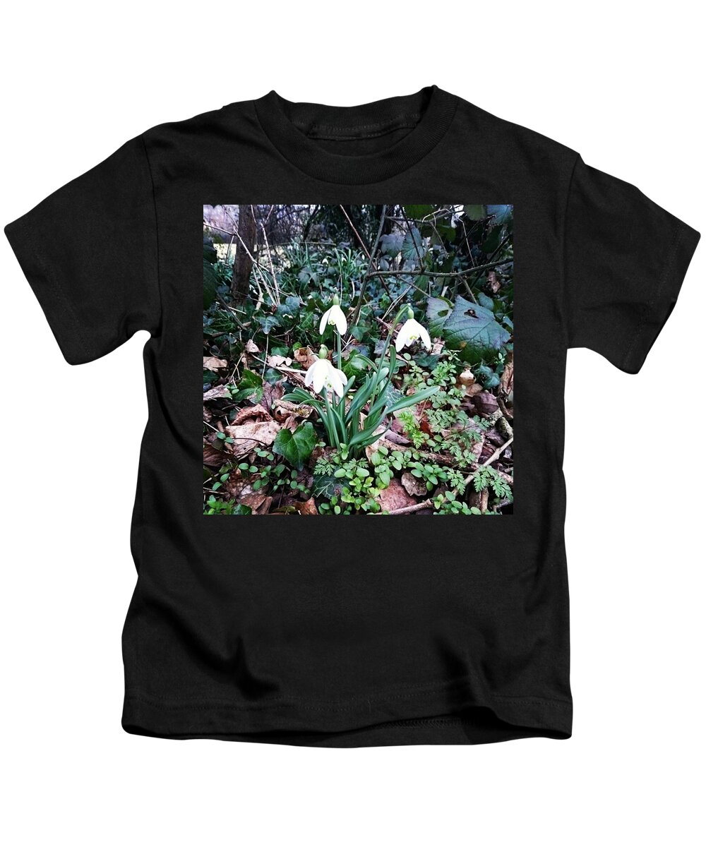 Snowdrops Kids T-Shirt featuring the photograph First Spring Flowers by Sarah Qua