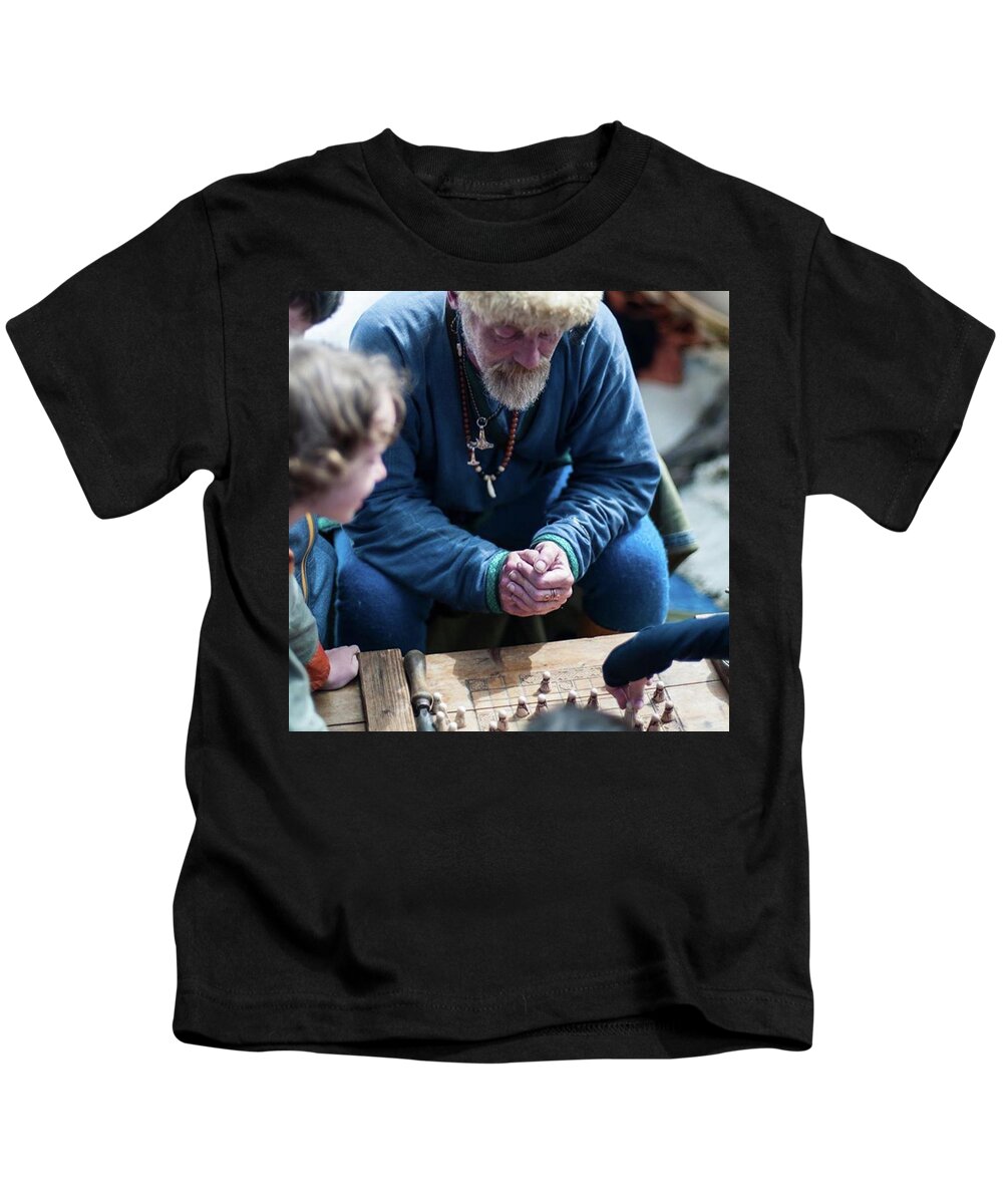 Play Kids T-Shirt featuring the photograph The Game by Aleck Cartwright