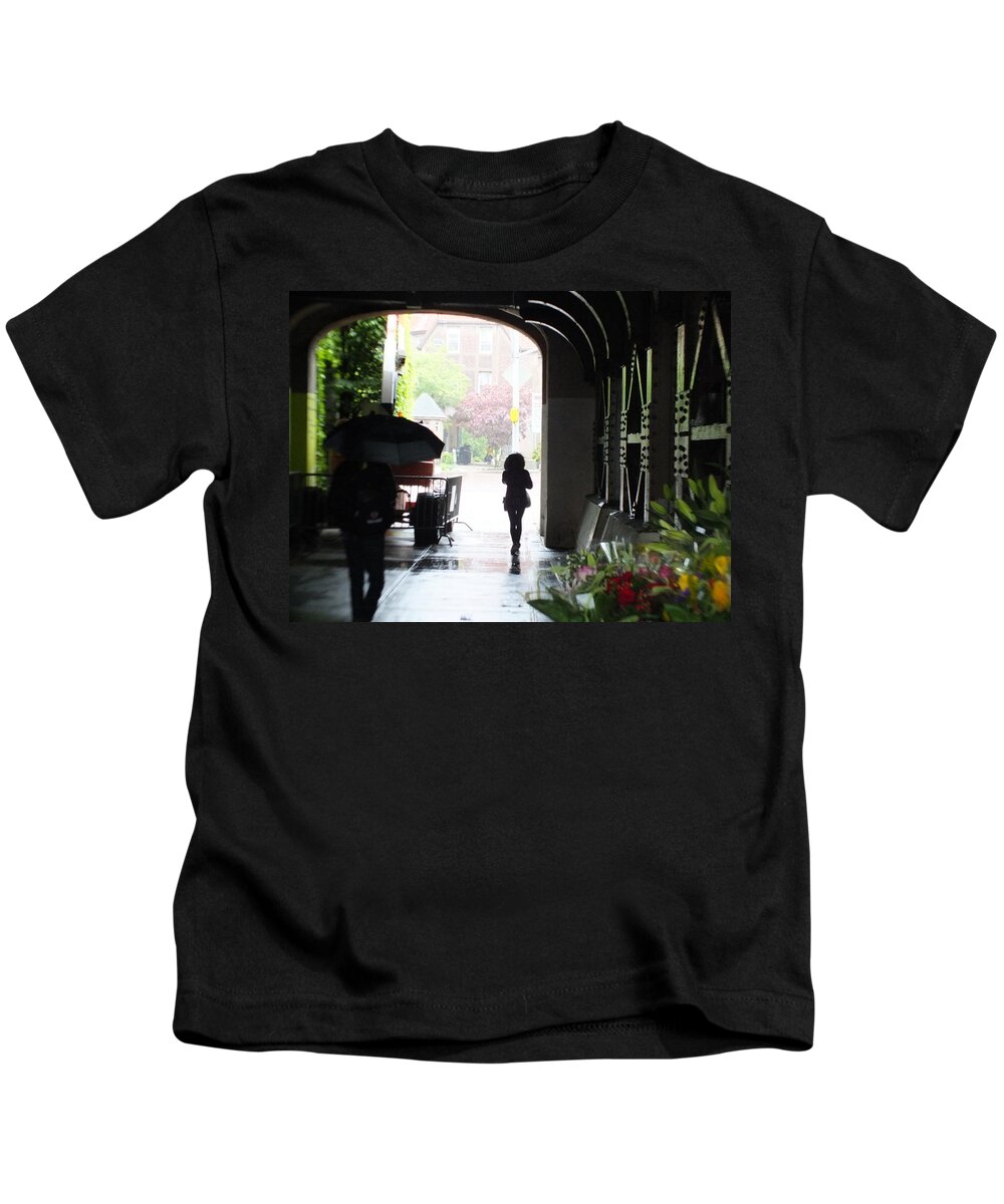Walking In The Rain Under The Elevated Train Kids T-Shirt featuring the photograph Walking in The rain under the Elevated Train by Nicholas Small