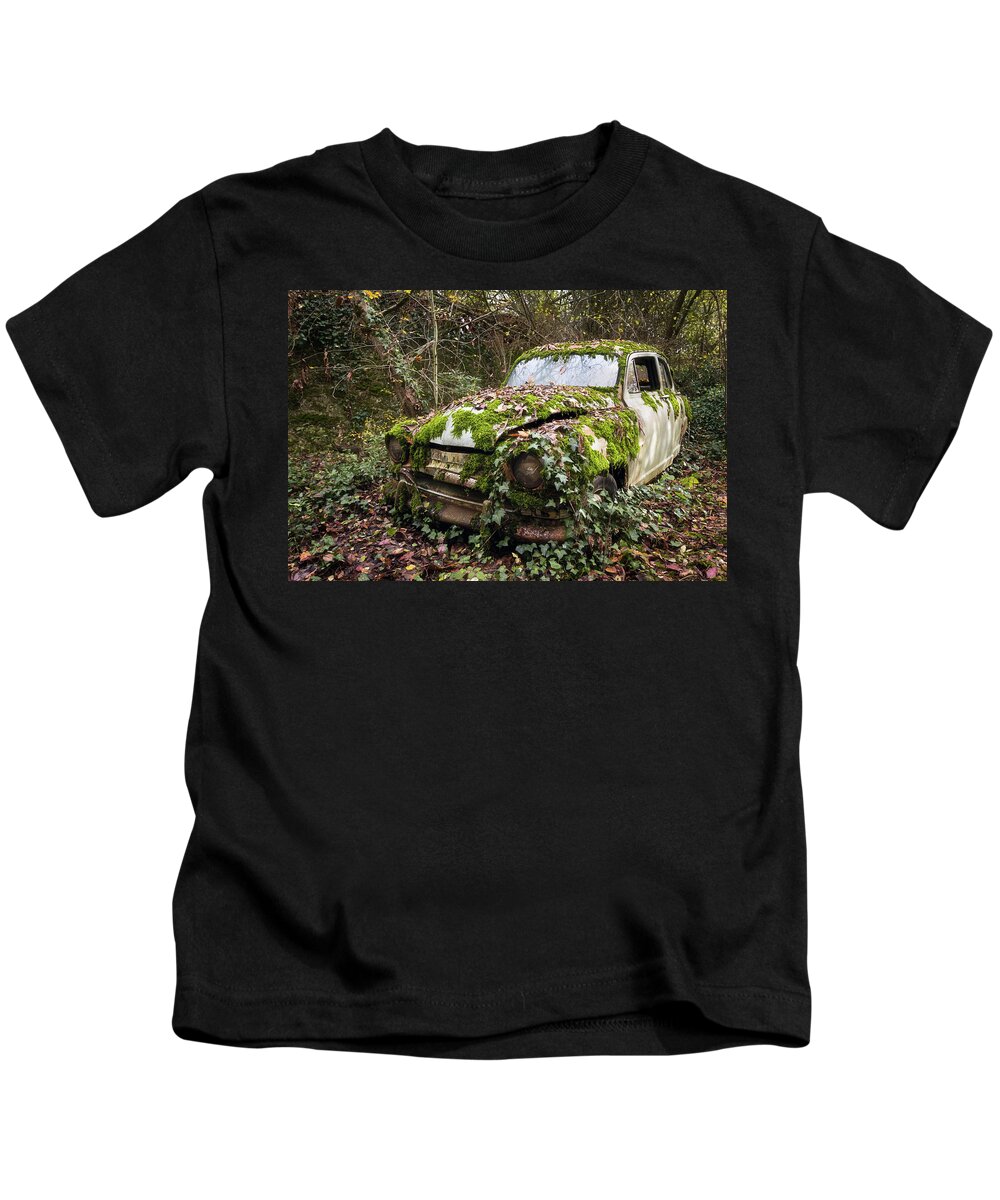 Urban Kids T-Shirt featuring the photograph Abandoned Simca Car in the Woods by Roman Robroek