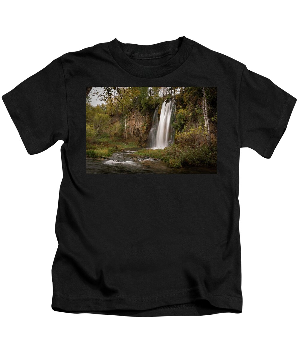 #southdakota #spearfishfalls #waterfall #spearfishcanyon #autumn #littlespearfishcreek #spearfishcreek Kids T-Shirt featuring the photograph Autumn at Spearfish Falls by Greni Graph