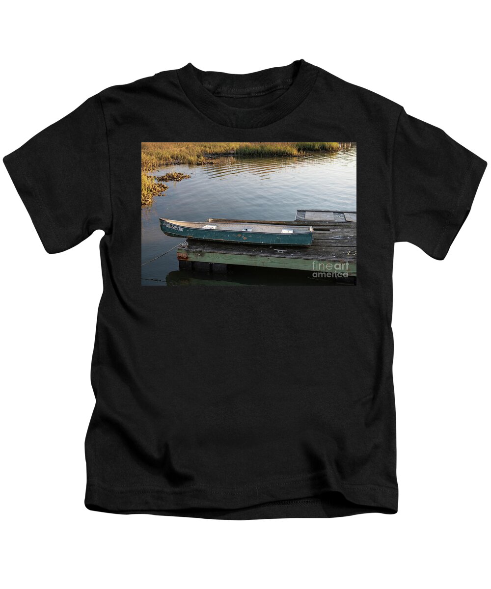 Canoe Kids T-Shirt featuring the photograph Old Canoe on Dock in Shem Creek by Dale Powell