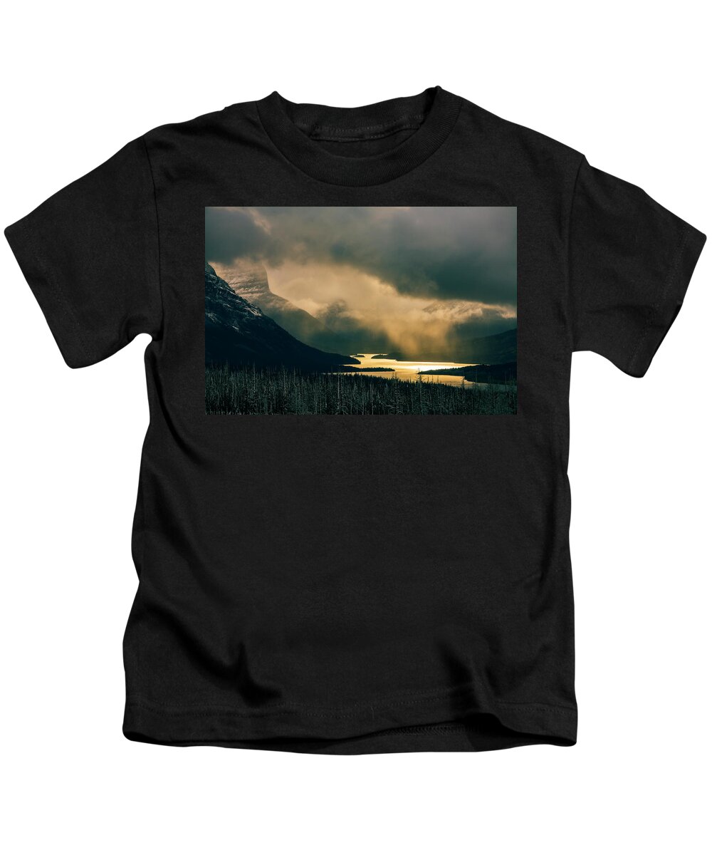 Glacier National Park Kids T-Shirt featuring the photograph Snowstorm, St. Mary's Lake by Todd Bannor