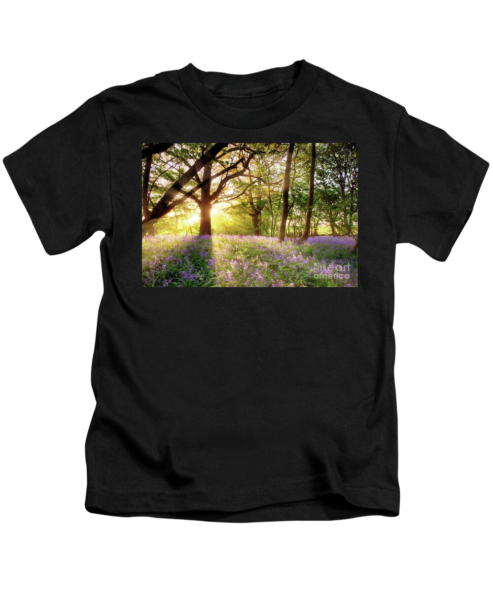 Norfolk Kids T-Shirt featuring the photograph Norfolk sunrise in bluebell forest England by Simon Bratt