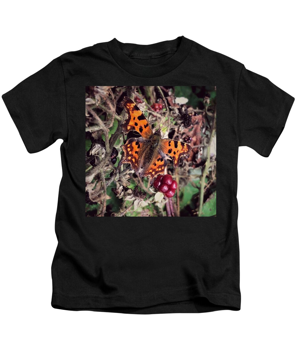 Butterfly Kids T-Shirt featuring the photograph Butterfly on Fruit by Mark Egerton