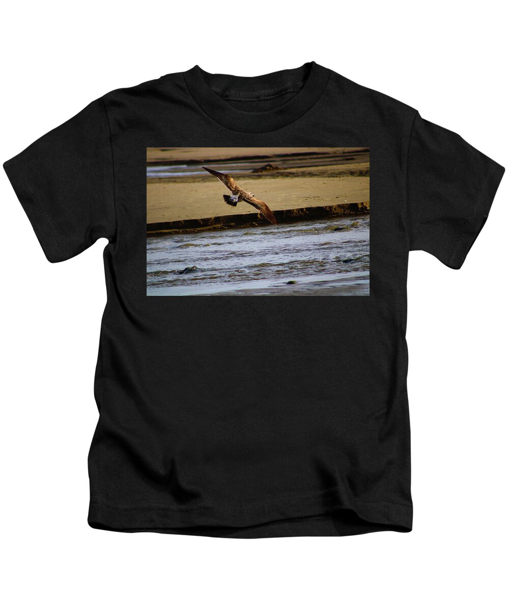 Bird Kids T-Shirt featuring the photograph Flight of the Seagull by Marcus Jones
