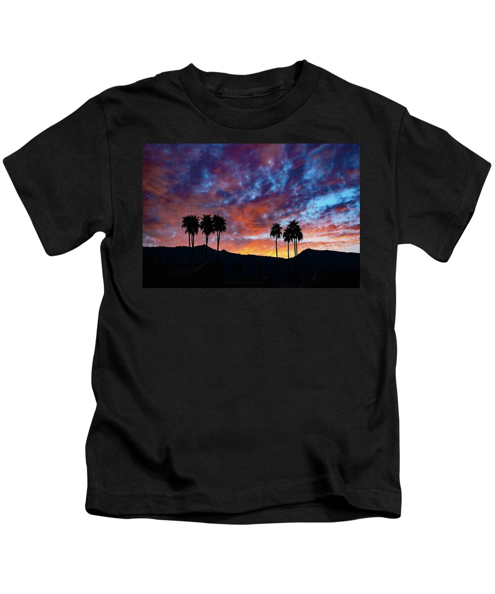 Sunset Kids T-Shirt featuring the photograph Luminous Desert Sunset Skies Behind Palm Trees, Palm Desert California by Bonnie Colgan