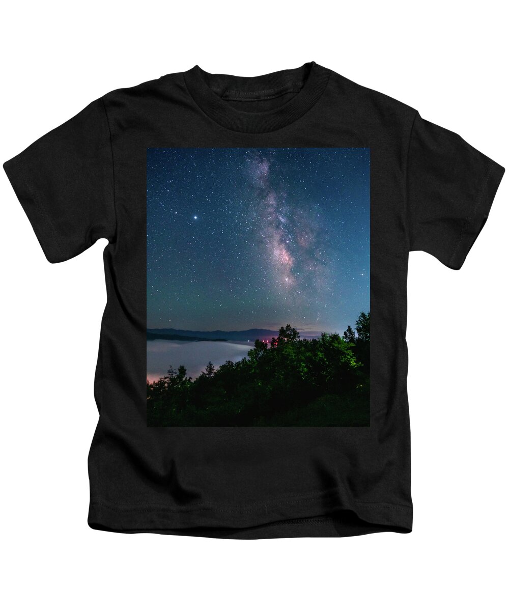 Milky Way Kids T-Shirt featuring the photograph Milky Way over the clouds by Darrell DeRosia
