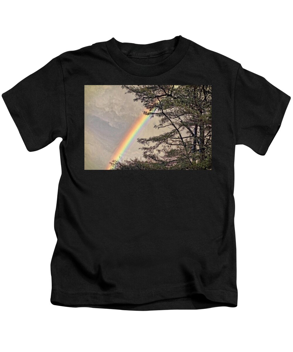 Rainbow Kids T-Shirt featuring the photograph Northern Forest Rainbow by Russel Considine