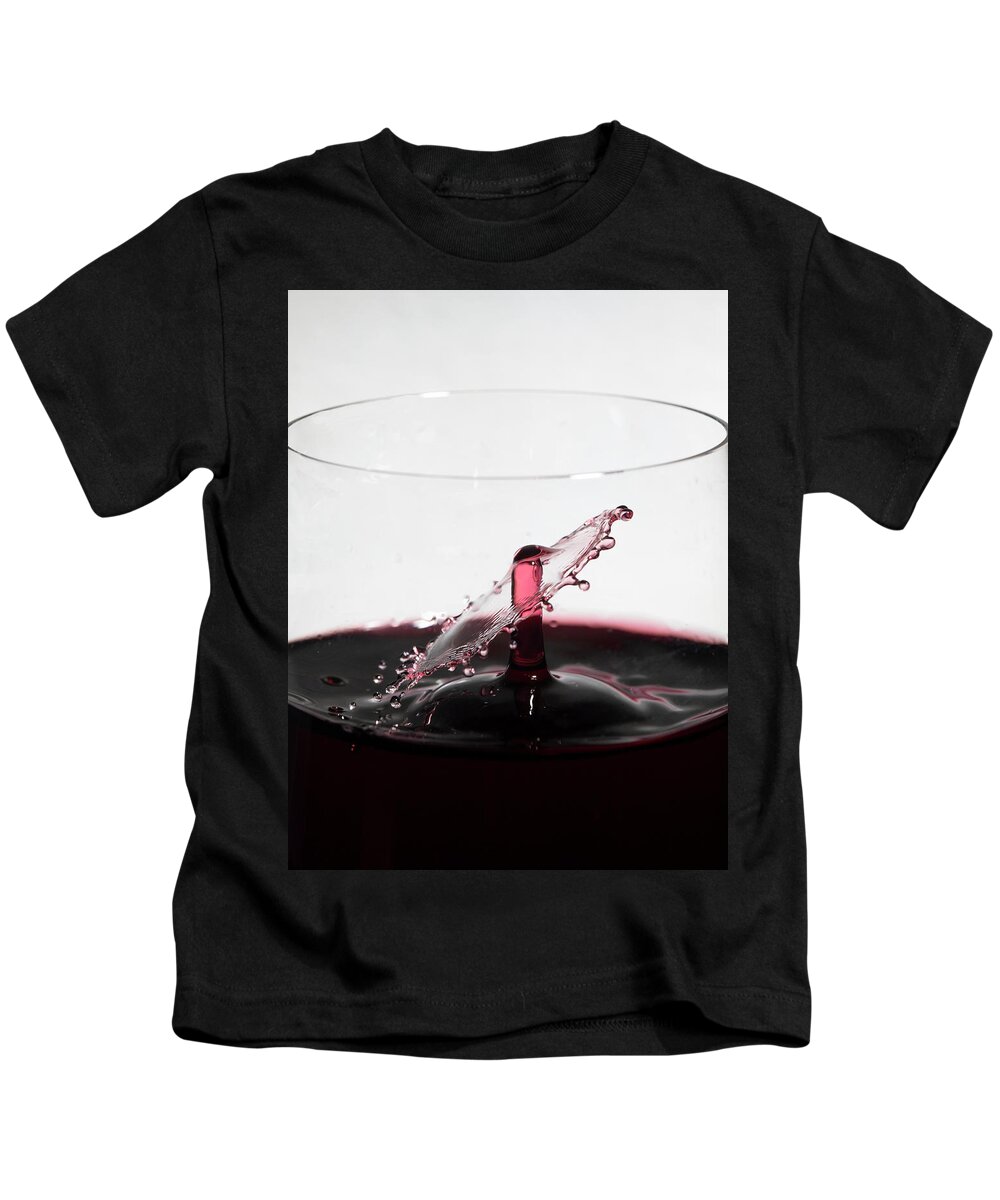 North Wilkesboro Kids T-Shirt featuring the photograph Wine Drops Collide Inside Glass by Charles Floyd