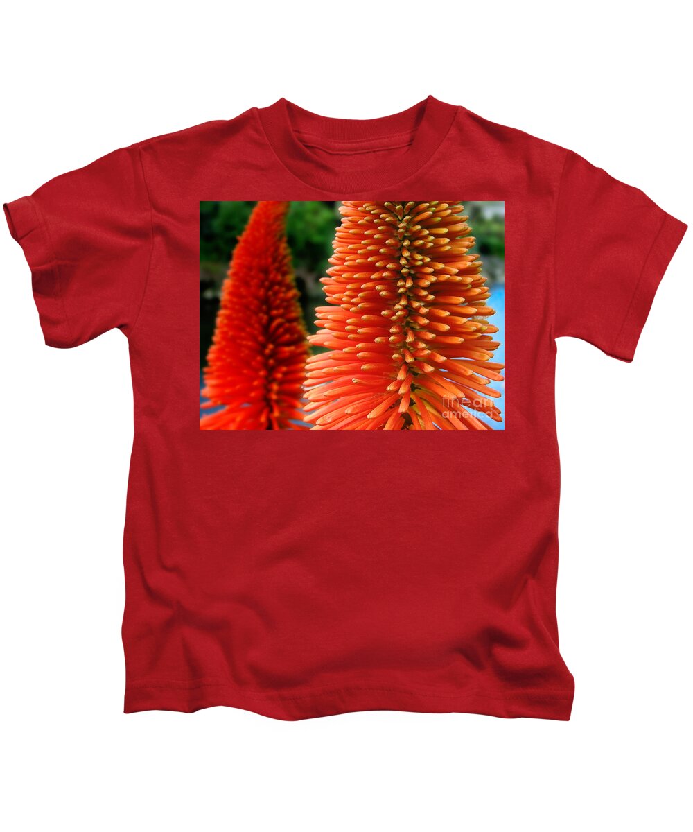 Spring Kids T-Shirt featuring the photograph Red-orange flower of Eremurus Ruiter-Hybride by Jola Martysz