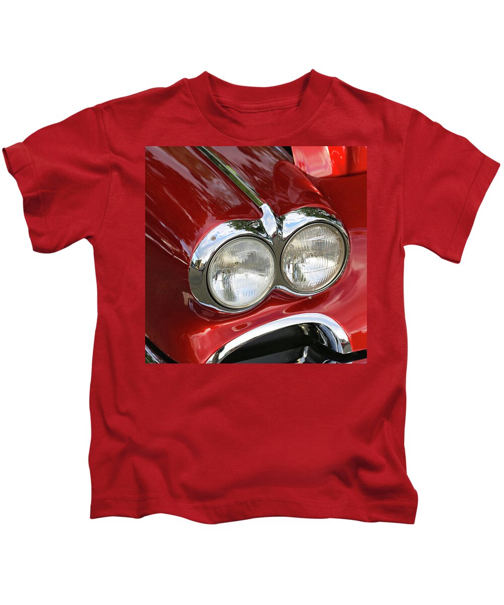 American Classic Automobile Chevrolet Red Corvette Front Lights Kids T-Shirt featuring the photograph American Classic Automobile Chevrolet Red Corvette Front Lights by Paul Ranky