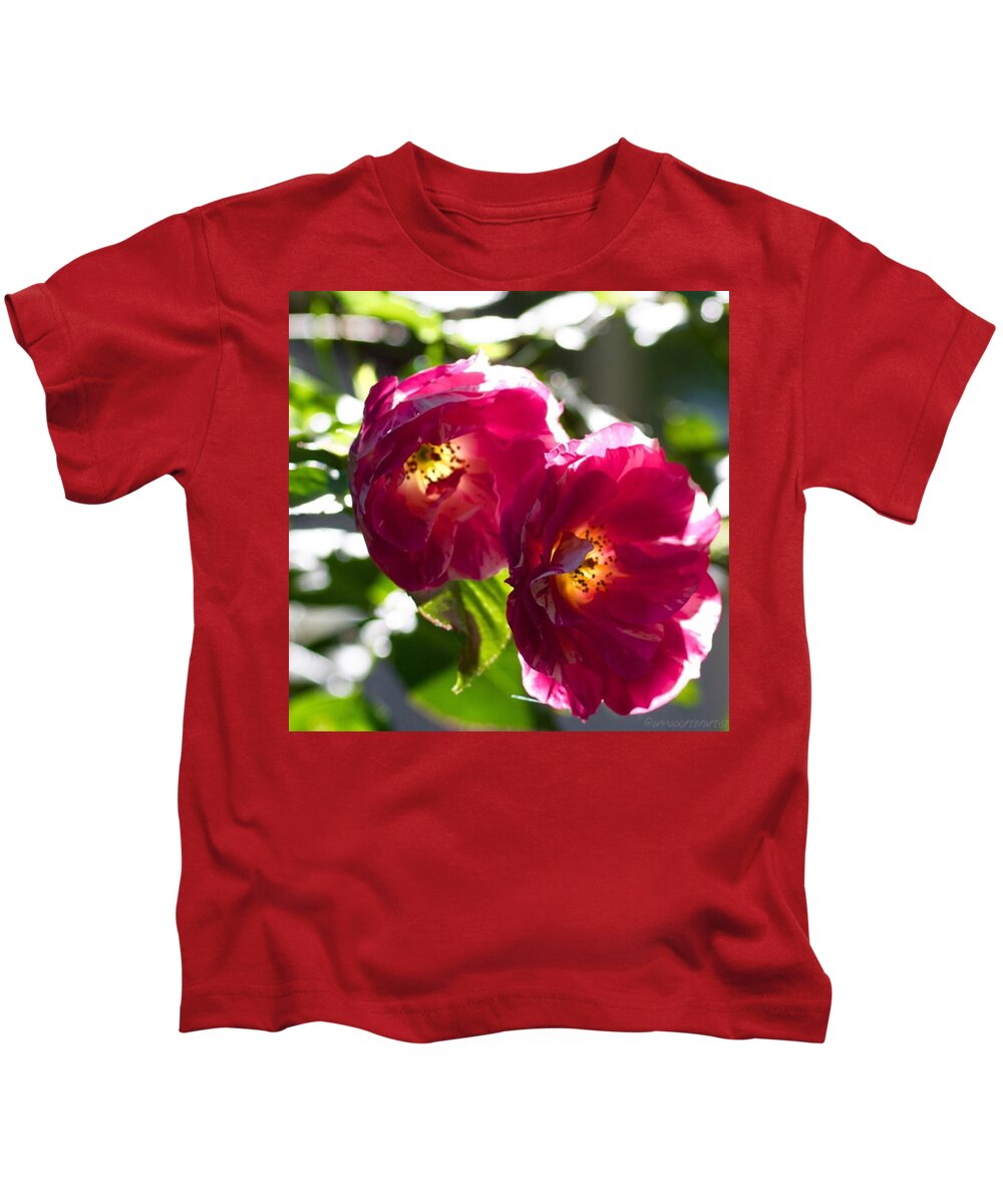Backlit Roses In My Garden Kids T-Shirt featuring the photograph Backlit Roses In My Garden by Anna Porter