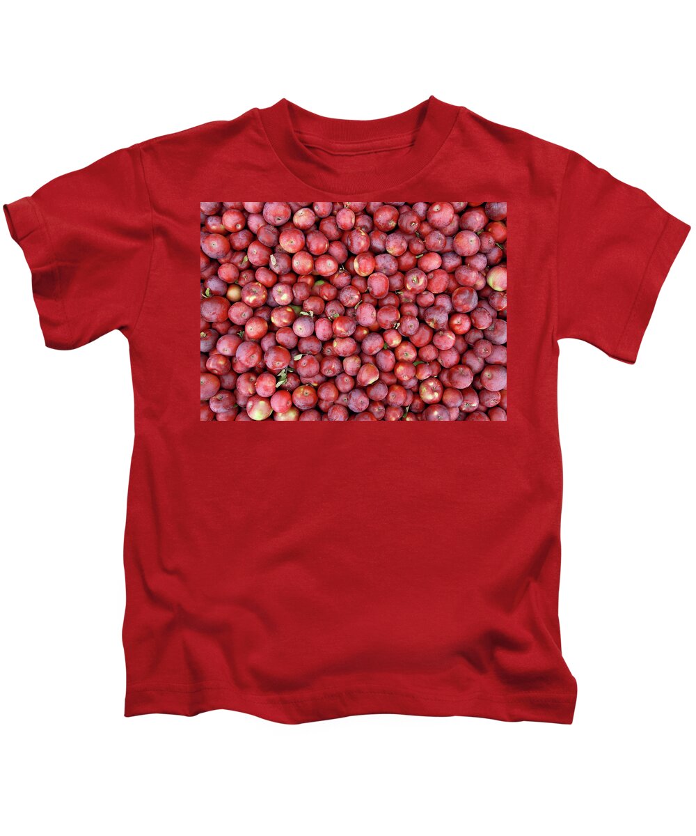 Apple Kids T-Shirt featuring the photograph Red apples background by GoodMood Art