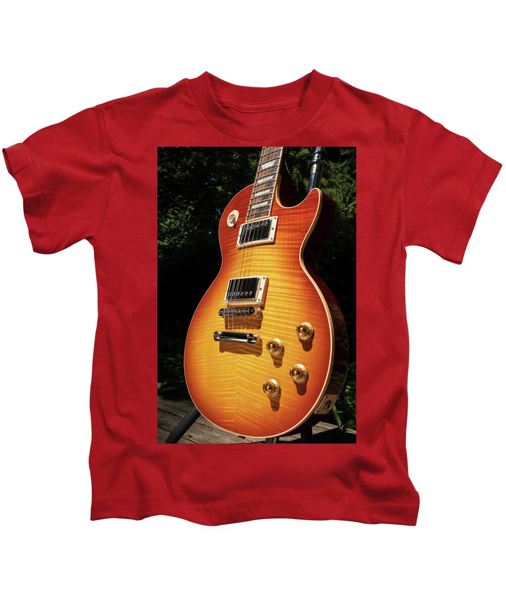 Guitar Kids T-Shirt featuring the photograph Sunburst In The Sun by John Clark