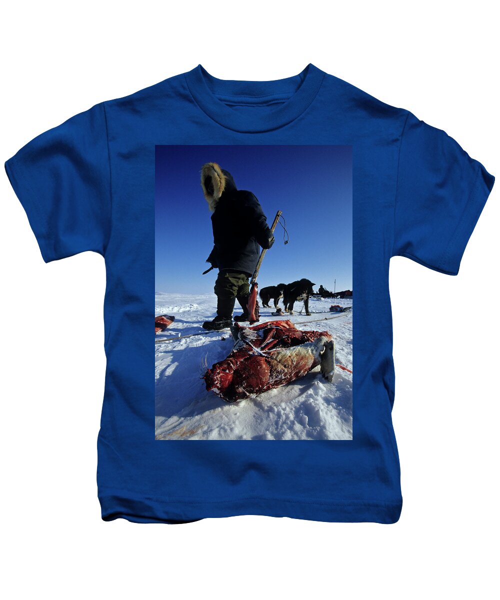 Dead Frozen Seal Being Fed To Dog Team Kids T-Shirt by Whit - Pixels