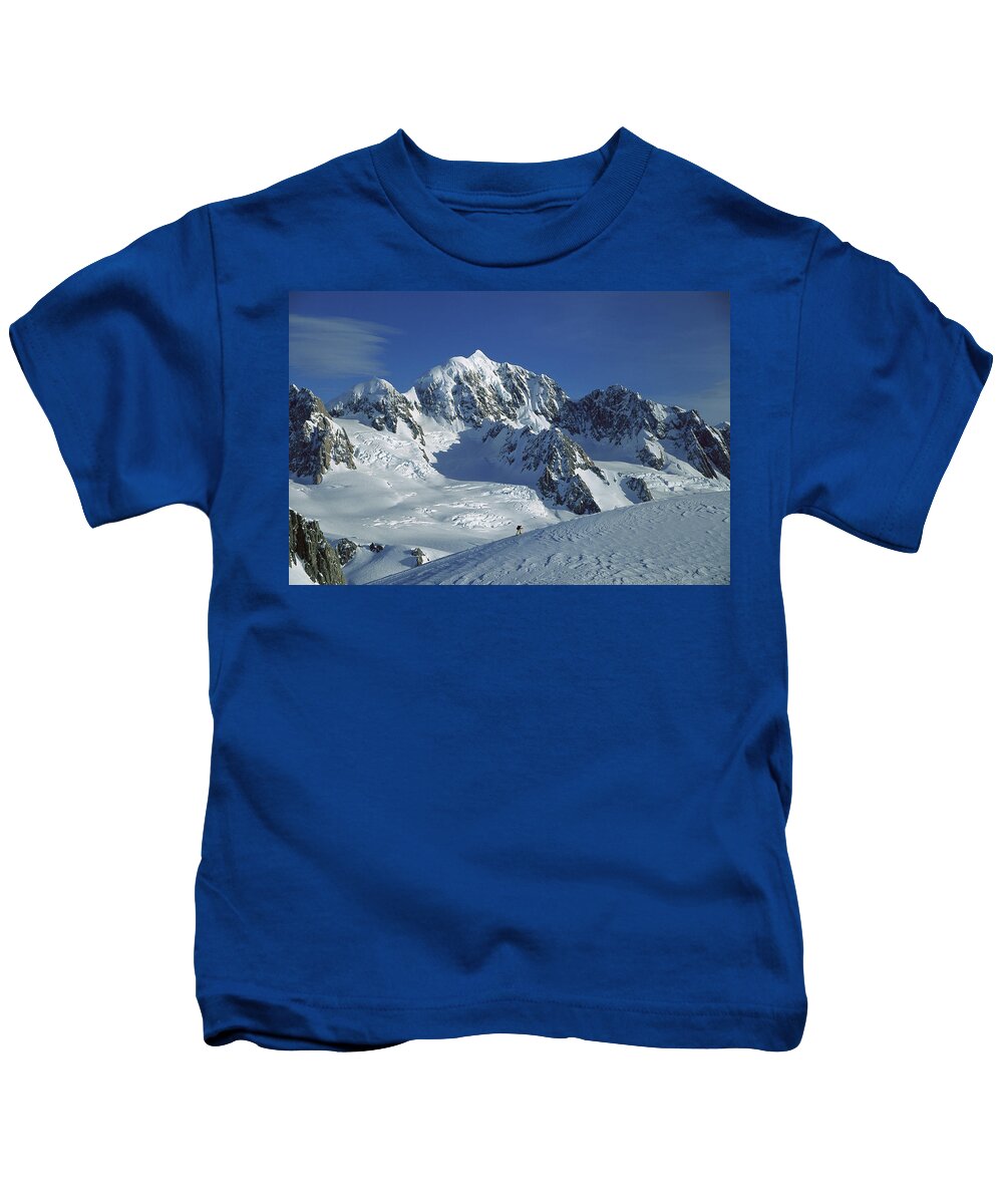 Feb0514 Kids T-Shirt featuring the photograph Ski Mountaineer And Mt Tasman by Colin Monteath