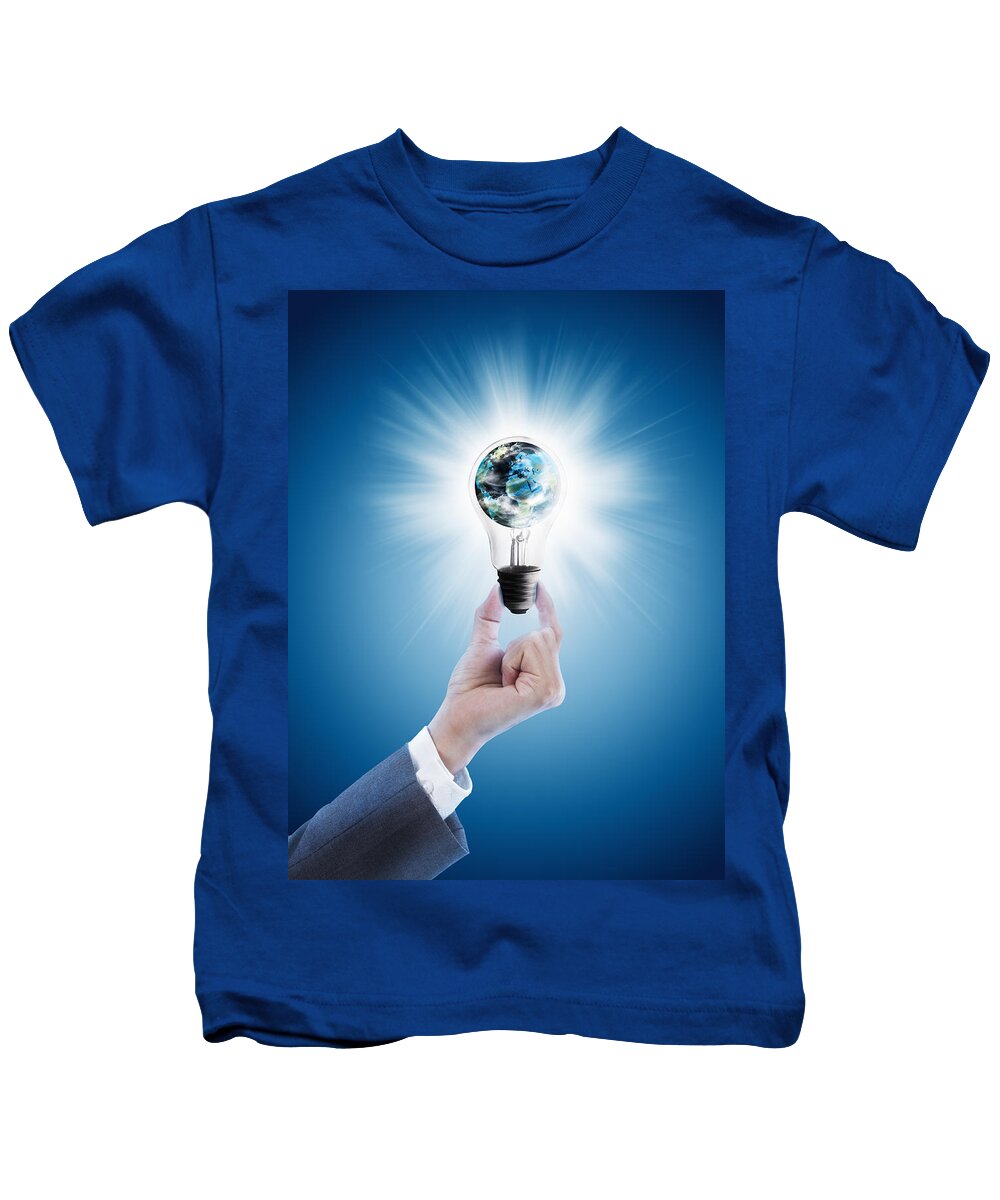 Background Kids T-Shirt featuring the photograph Hand holding light bulb with globe by Setsiri Silapasuwanchai