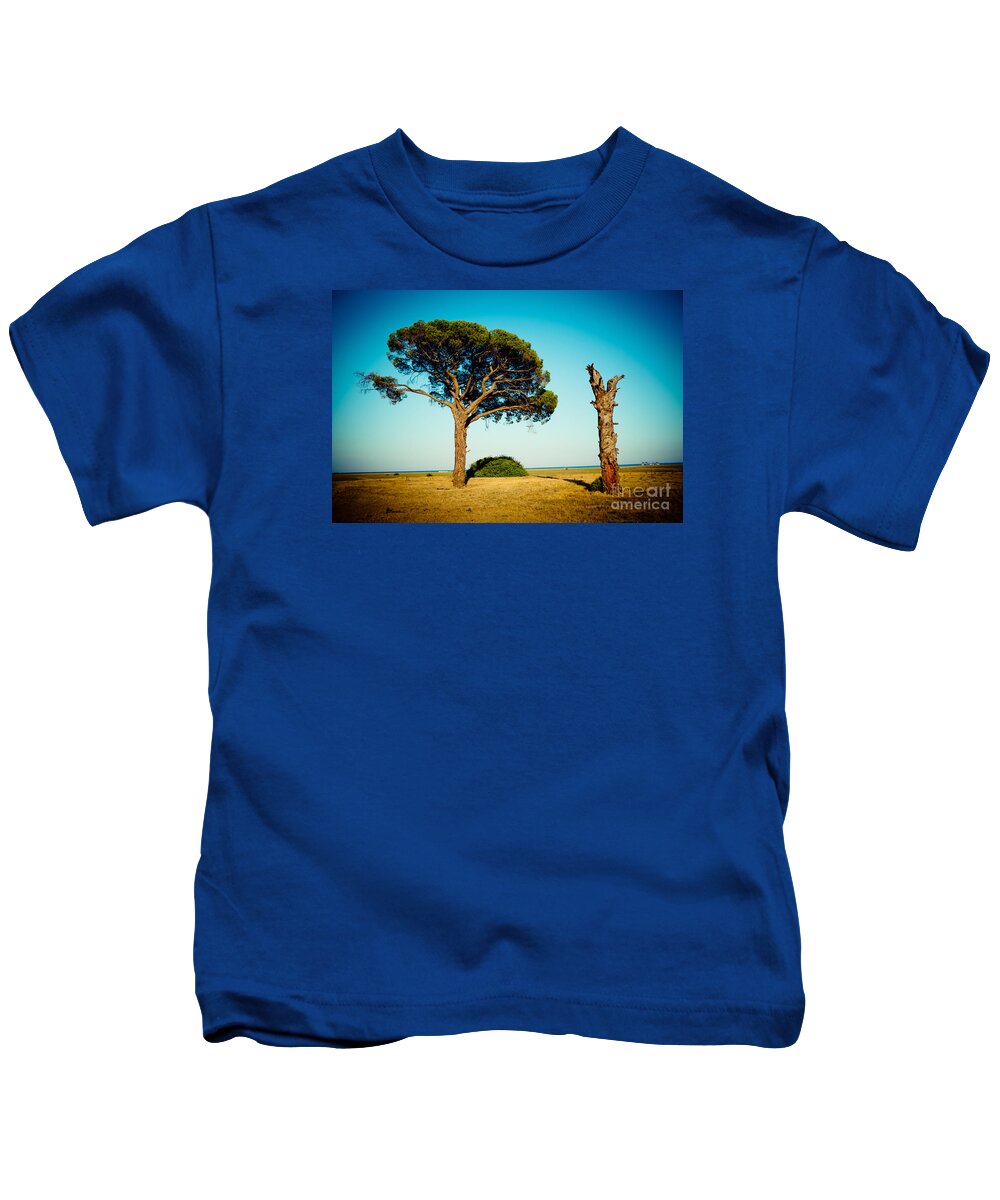 Water Kids T-Shirt featuring the photograph Live and dead tree at seacoast by Raimond Klavins