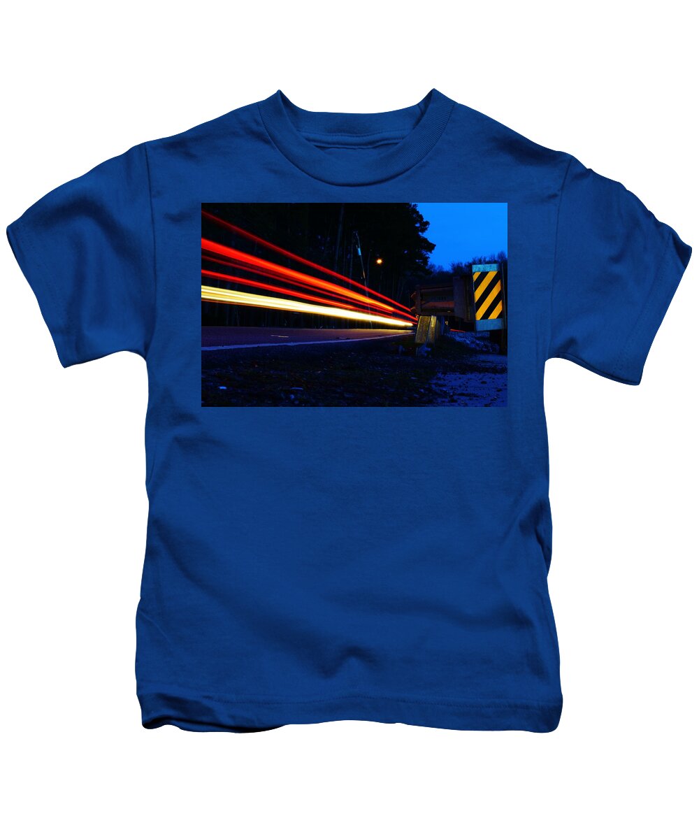 Light Trail Kids T-Shirt featuring the photograph The Trail To... by Nicole Lloyd