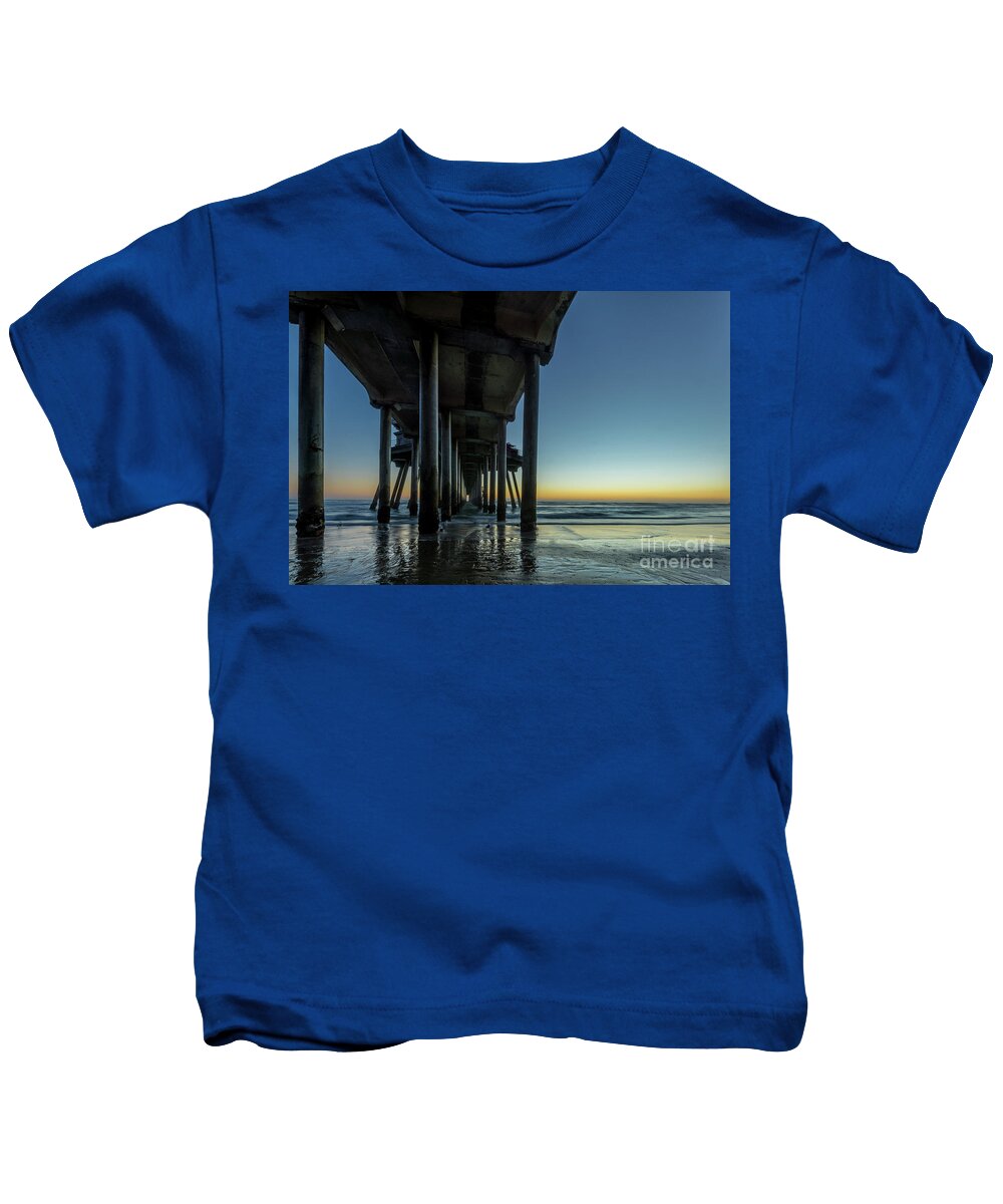 Beach Kids T-Shirt featuring the photograph Under The Pier by Paul Quinn