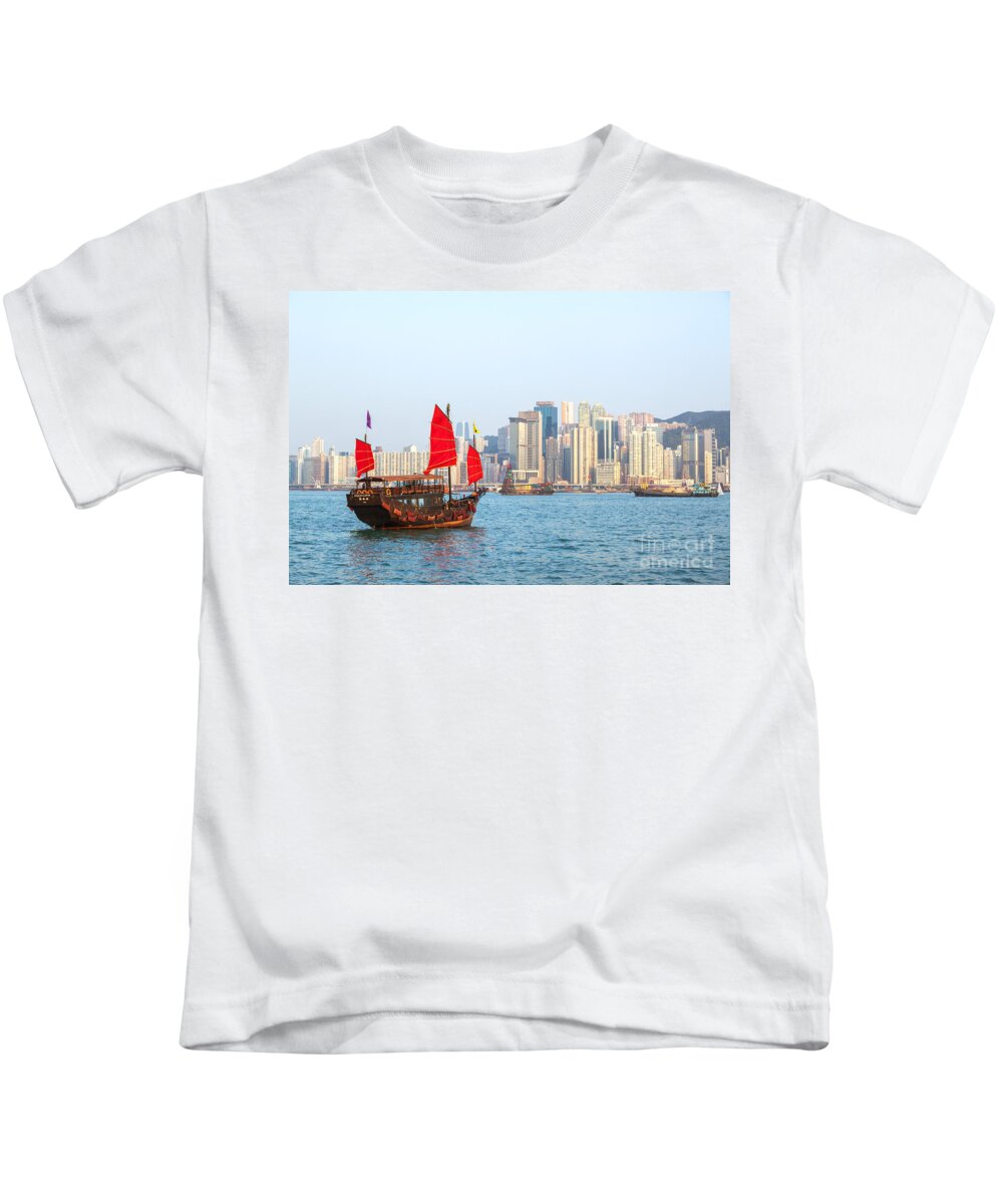 Hong Kong Kids T-Shirt featuring the photograph Chinese junk boat sailing in Hong Kong harbor #1 by Matteo Colombo