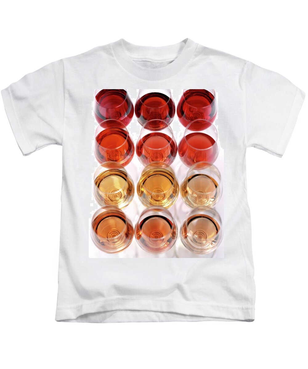 Food Kids T-Shirt featuring the photograph Glasses Of Rose Wine by Romulo Yanes