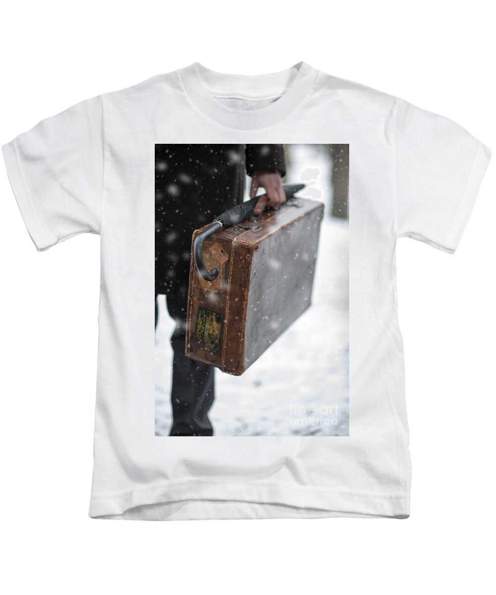Man Holding A Vintage Leather Suitcase In Winter Snow Kids T-Shirt by Lee  Avison - Fine Art America