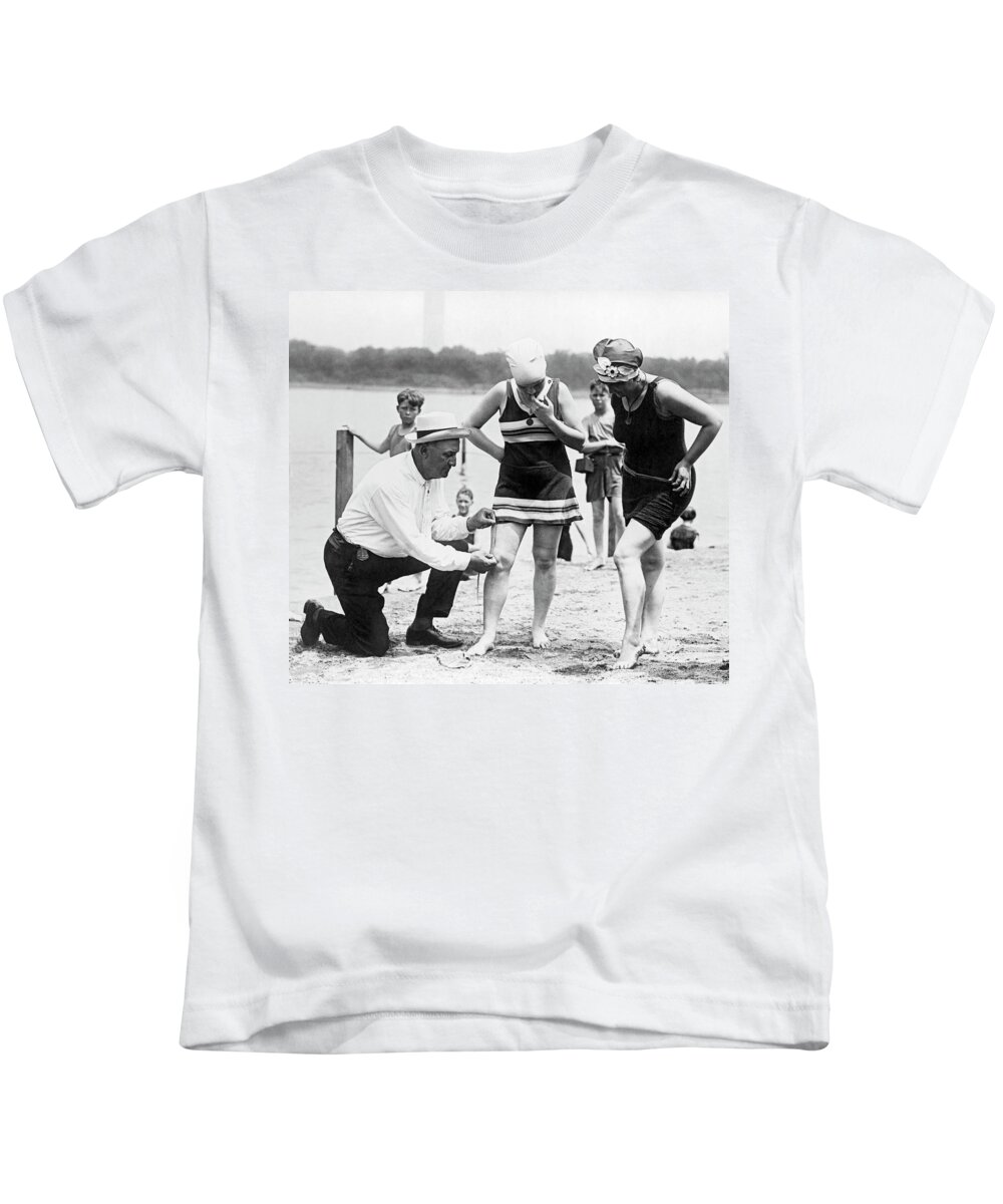 1920s Kids T-Shirt featuring the photograph Measuring Bathing Suits by Underwood Archives