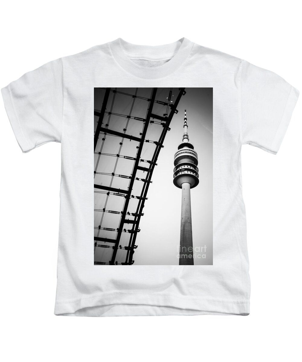 Architecture Kids T-Shirt featuring the photograph Munich - Olympiaturm And The Roof - Bw by Hannes Cmarits