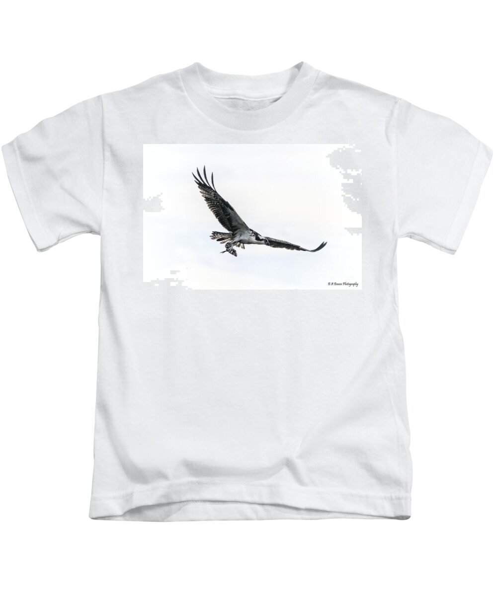 Osprey Kids T-Shirt featuring the photograph Osprey in flight by Barbara Bowen