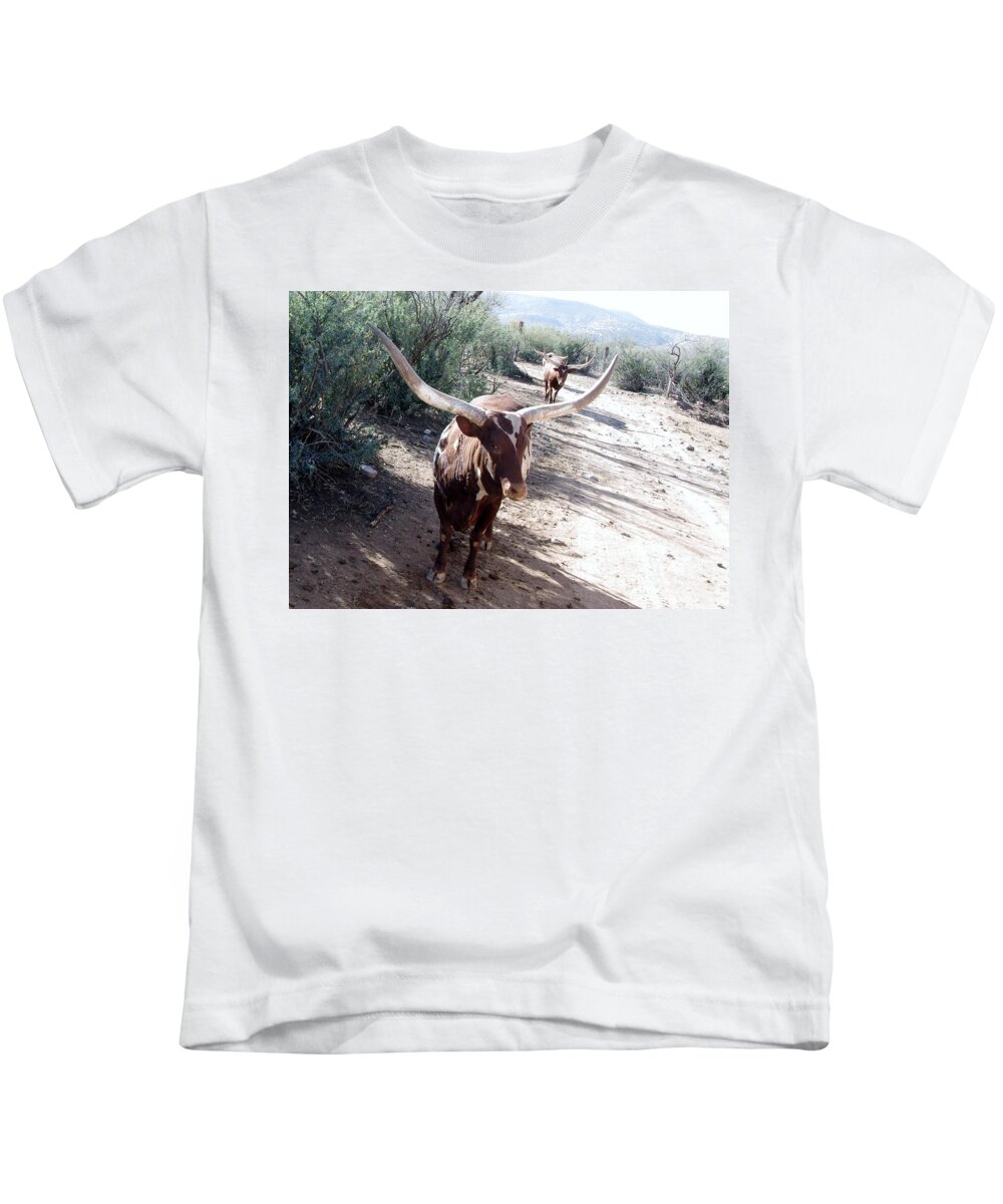 Out Of Africa Kids T-Shirt featuring the photograph Out of Africa Long Horns by Phyllis Spoor