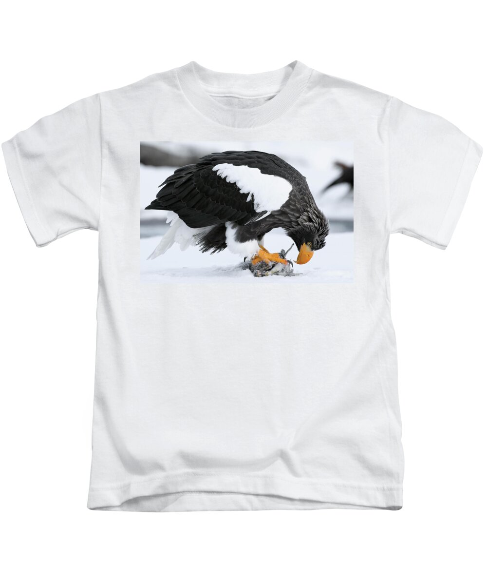 00782295 Kids T-Shirt featuring the photograph Stellers Sea Eagle Feeding by Sergey Gorshkov