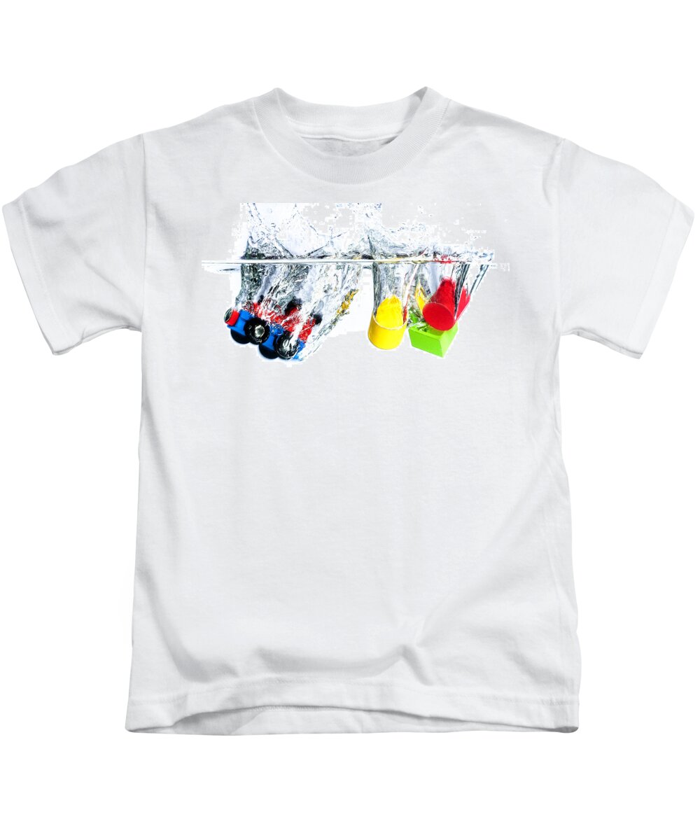 Toys Kids T-Shirt featuring the photograph Wooden toys in water by Mike Santis