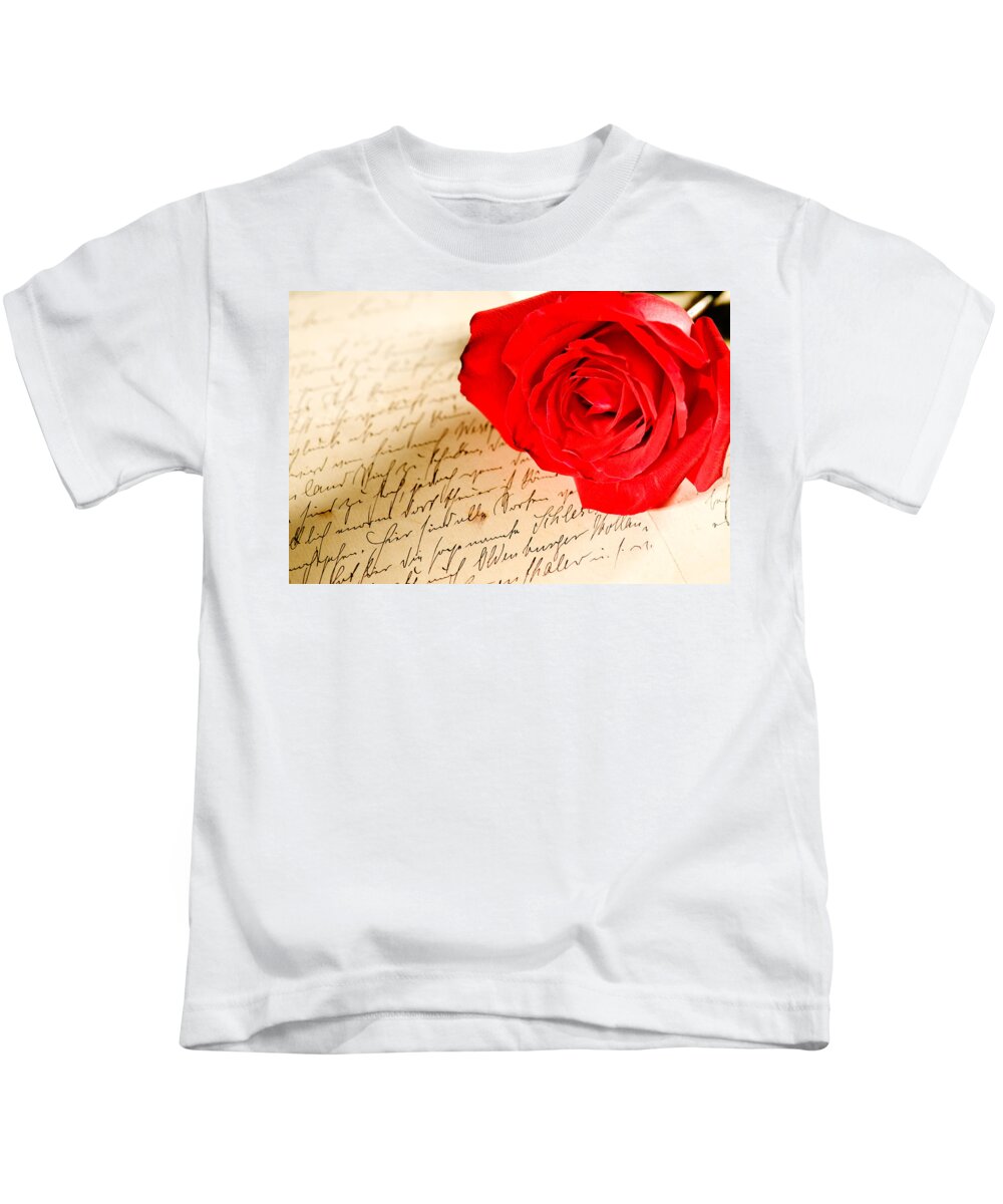 Alliance Kids T-Shirt featuring the photograph Red rose over a hand written letter by U Schade