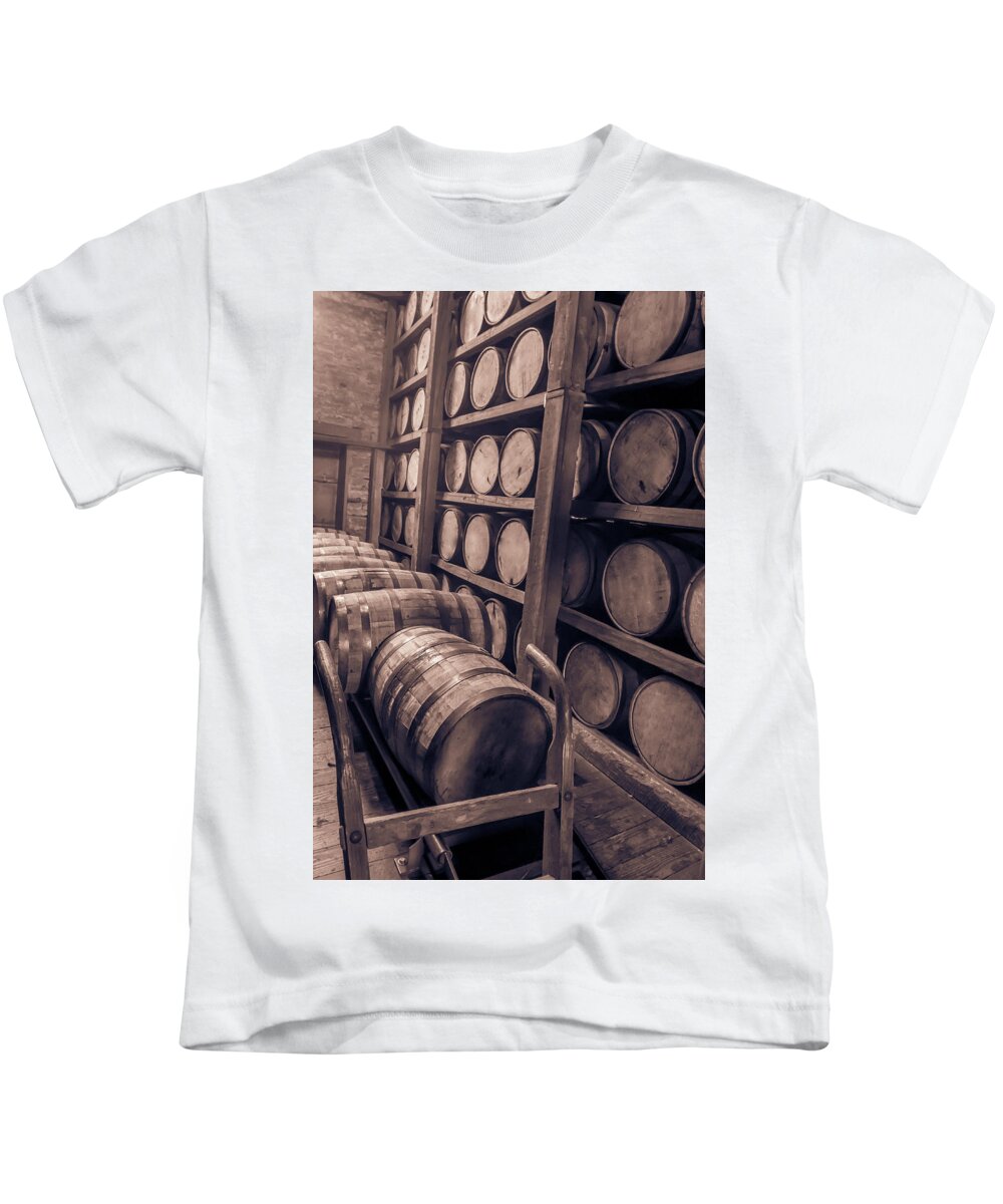 Aging. Age Kids T-Shirt featuring the photograph Oak barrels in RIk house #1 by Karen Foley