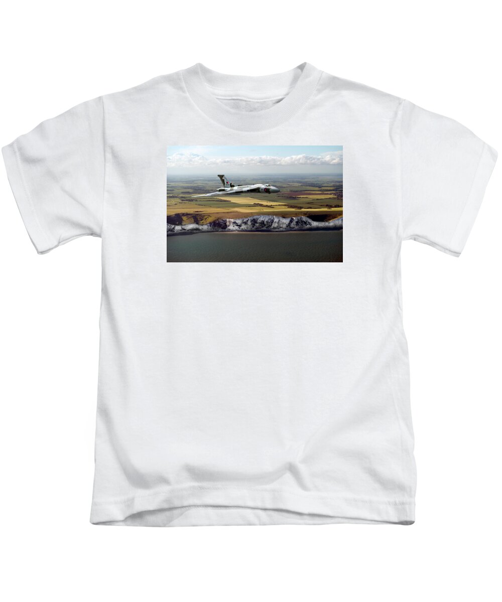 Avro Vulcan Kids T-Shirt featuring the photograph Avro Vulcan over the white cliffs of Dover by Gary Eason