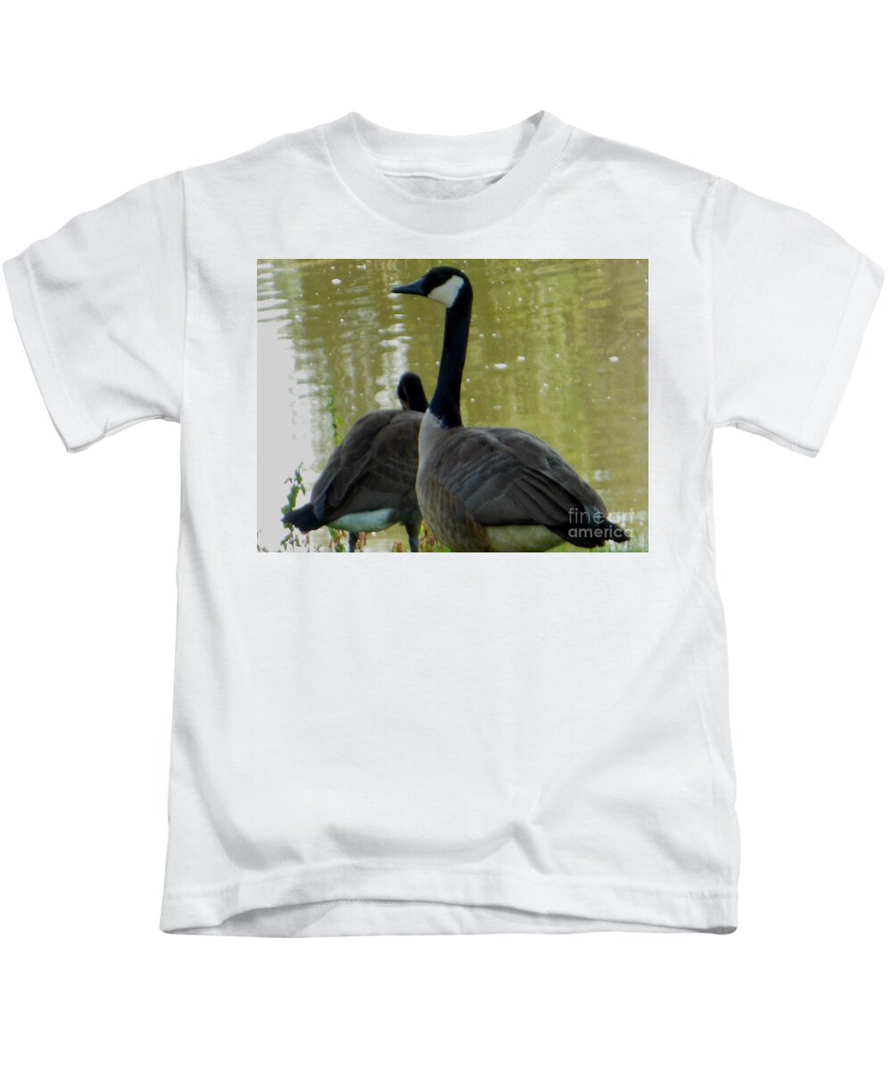 Canada Goose Kids T-Shirt featuring the photograph Canada Goose Edge of Pond by Rockin Docks Deluxephotos