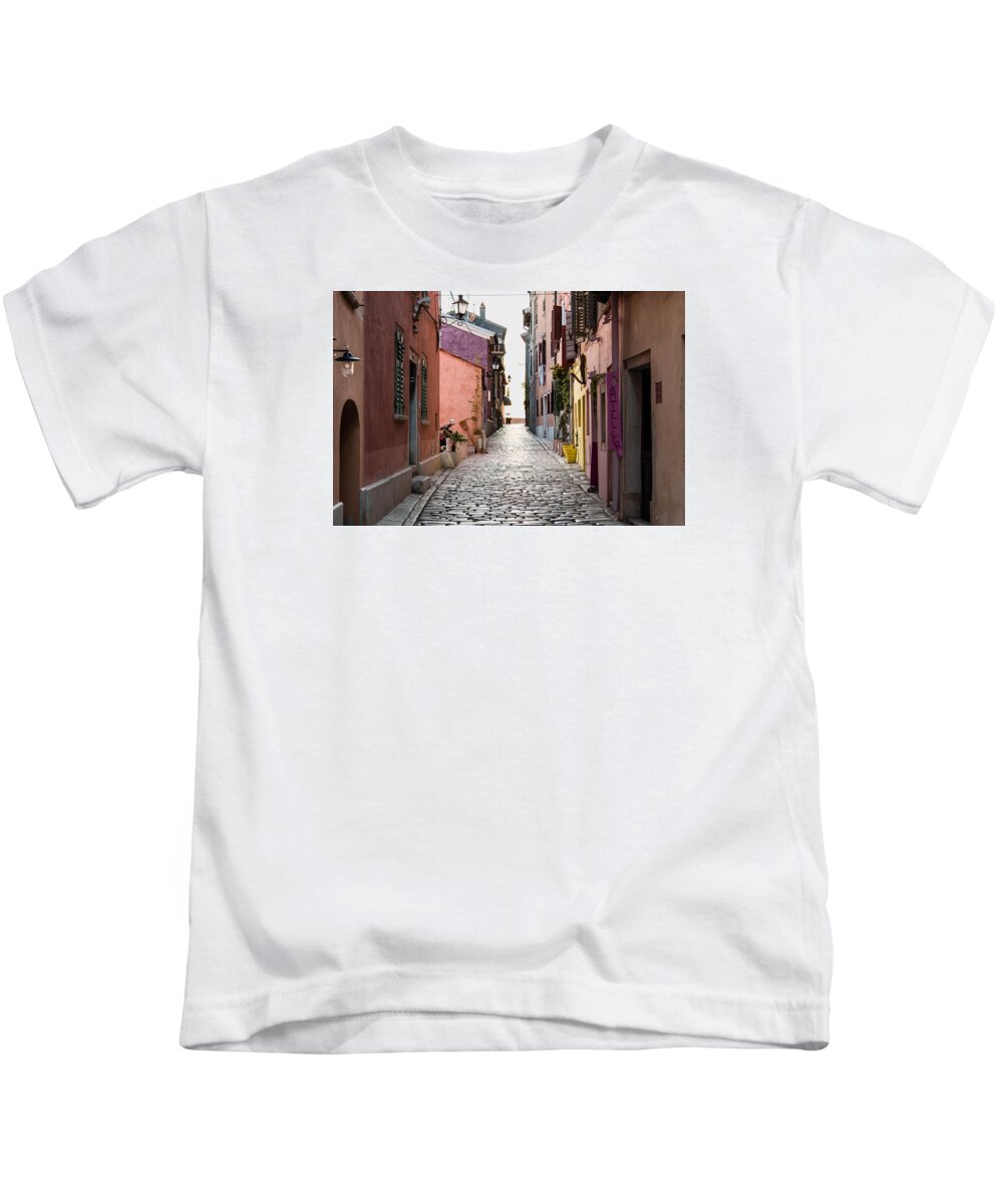 Rovigno Kids T-Shirt featuring the photograph Cobbled street - 1 by Claudio Maioli