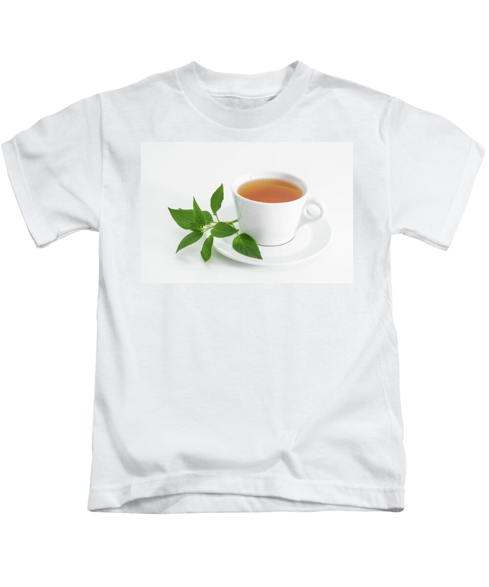 Tea Kids T-Shirt featuring the photograph Cup of tea with fresh mint by GoodMood Art