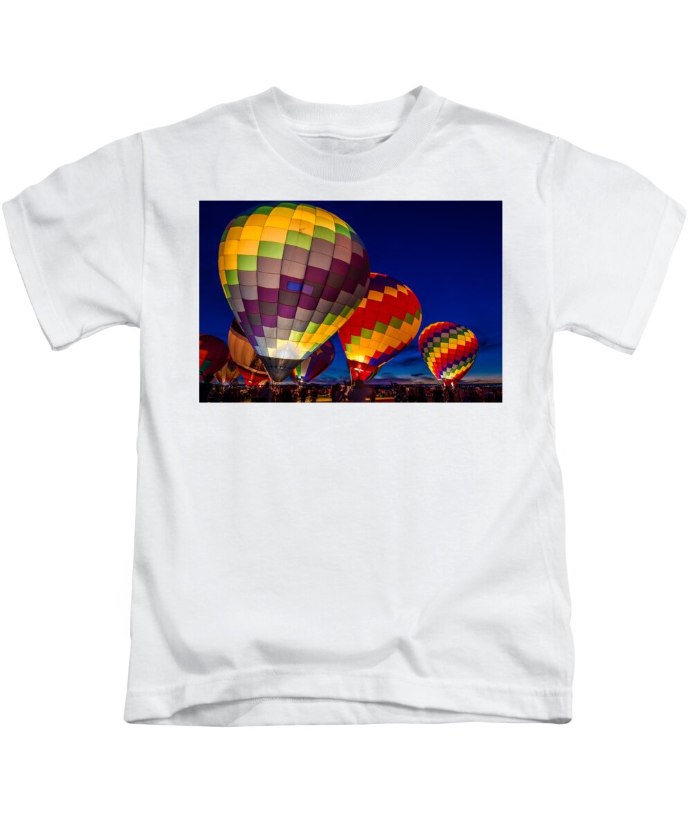 Albuquerque Hot Air Balloon Festival Kids T-Shirt featuring the photograph Glowing Fiesta by Ron Pate
