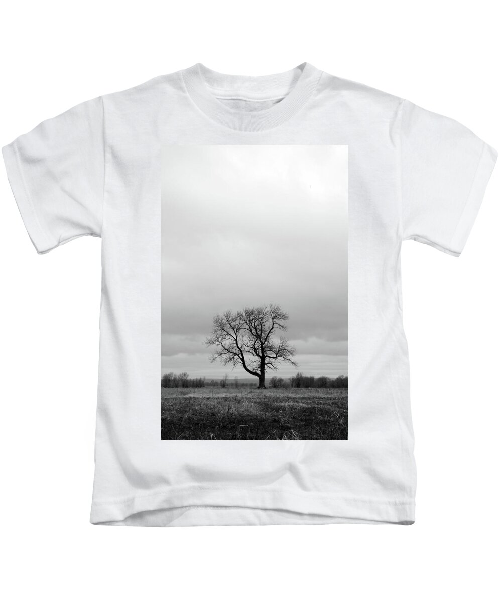 Tree Kids T-Shirt featuring the photograph Lonely tree in a spring field by GoodMood Art