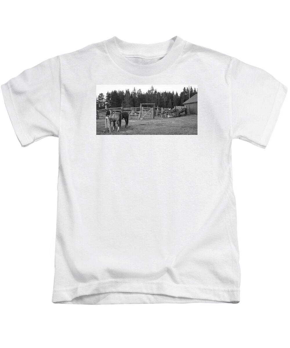 Wyoming Kids T-Shirt featuring the photograph Mountain Corrals by Diane Bohna