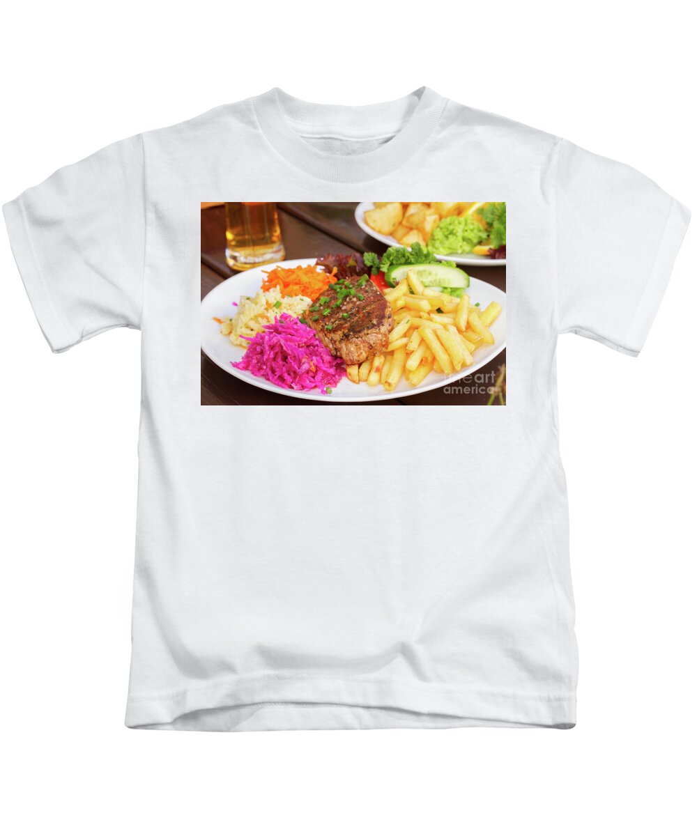 Steak Kids T-Shirt featuring the photograph Plate of Steak with Garnish by Anastasy Yarmolovich