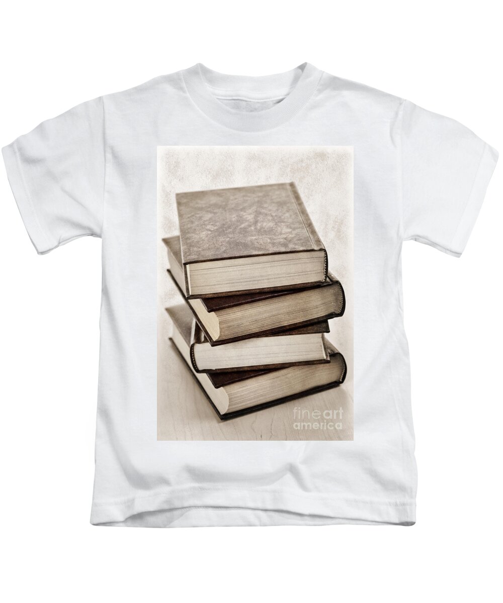 Books Kids T-Shirt featuring the photograph Stack of books by Elena Elisseeva