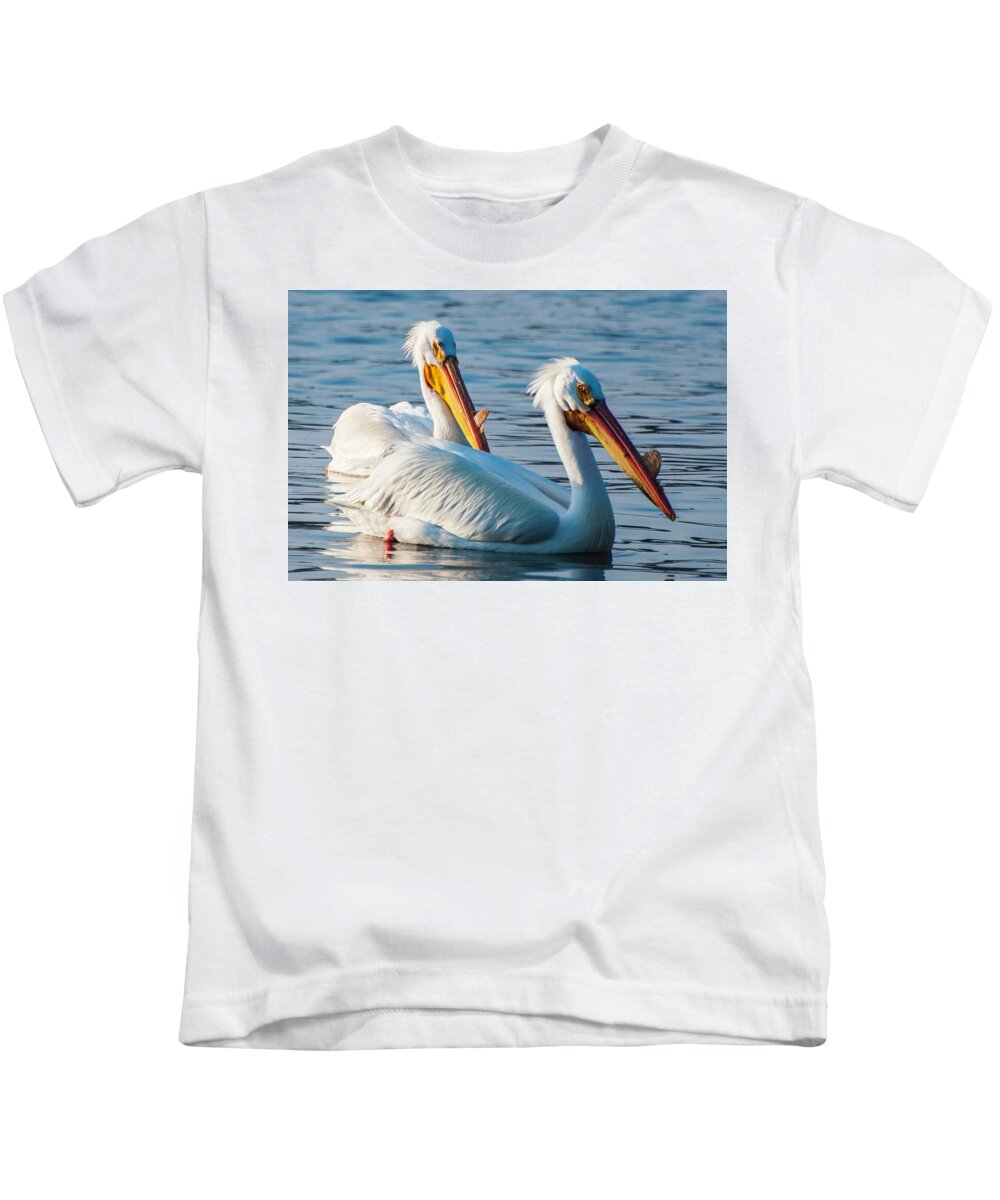 Pelicans Kids T-Shirt featuring the photograph The Pelican Couple by John Roach