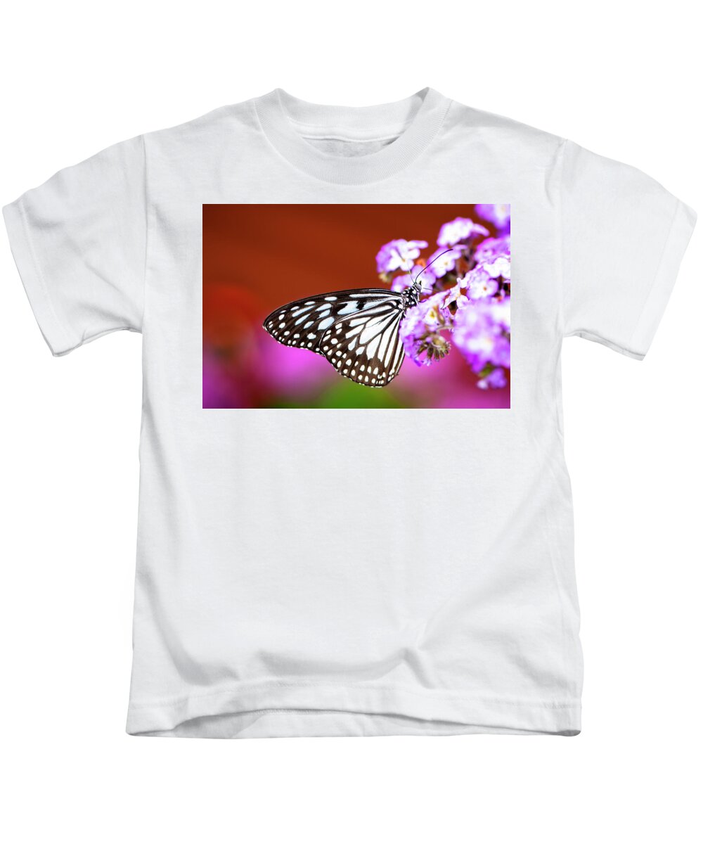 Colorful Kids T-Shirt featuring the photograph Butterfly and Purple Flowers by Oscar Gutierrez